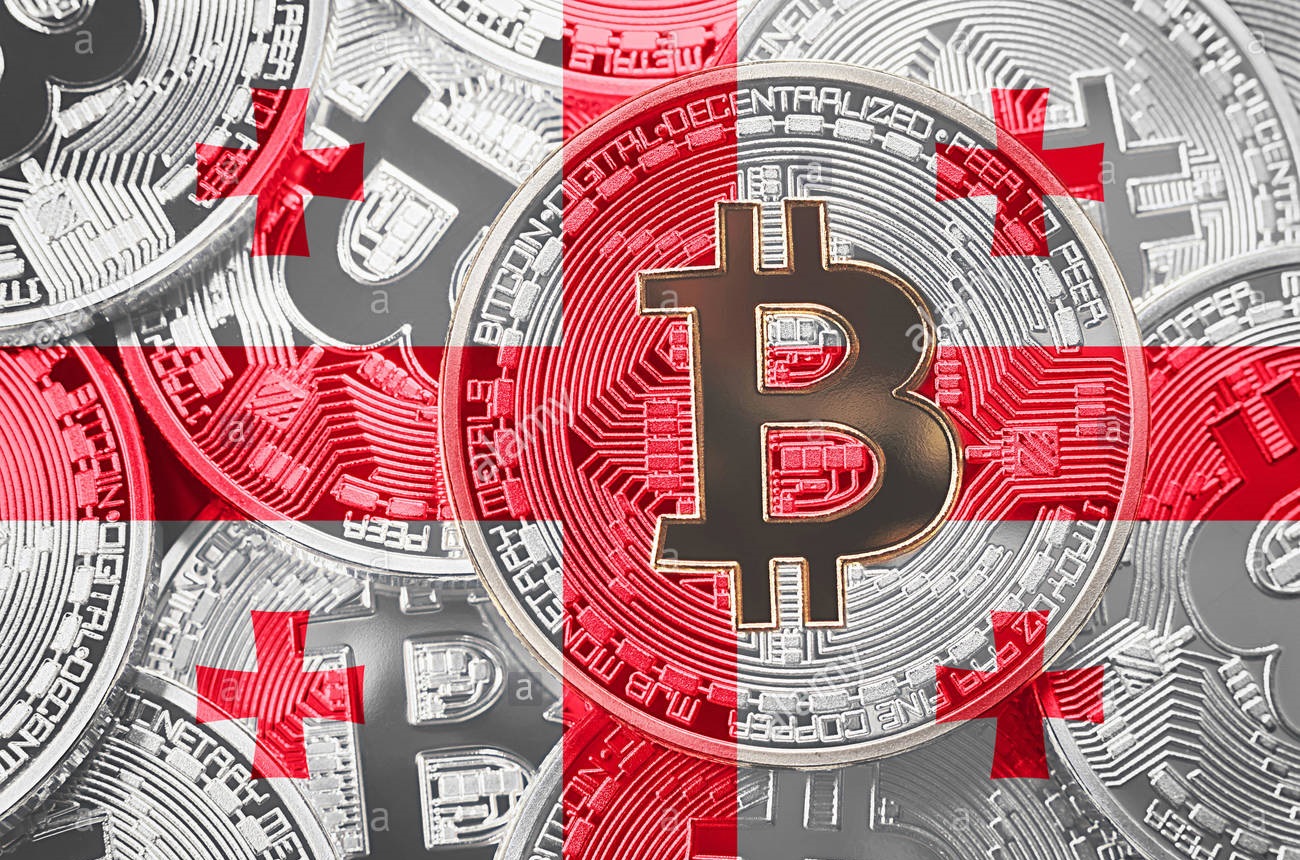Un boom di Bitcoin in Georgia fornito dall’energia idroelettrica - pila di bitcoin georgia bandiera bitcoin cryptocurrencies concetto btc sfondo p7ynbr