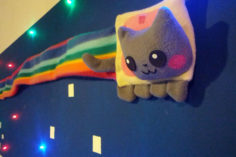 Nyan Cat NFT viene venduto per 300 ETH, aprendo le porte alla "Meme Economy" - nyan cat in a wall 236x157