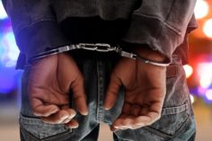 La polizia malese arresta un uomo per il mining di Bitcoin tramite elettricità rubata - arrest handcuff 236x157